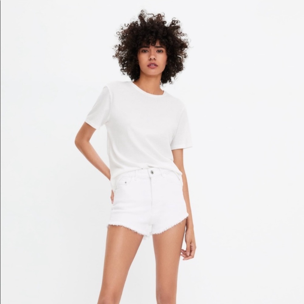 White high waisted distressed Jean shorts